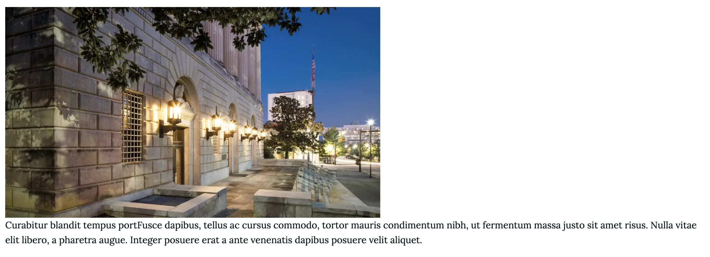 Building walls image with caption text that expands beyond the image