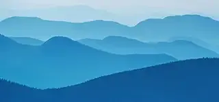 Overlapped mountains painted with water colors